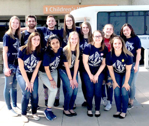 Megan Duval, back row on far left, with Saginaw Valley State University students at Arkansas Children’s Hospital. Duval is a 2016 Goodrich High School graduate.